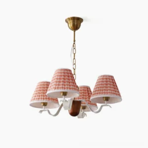 Dunnock mid-century fabric chandelier with red and white woven pattern shades, vintage brass hardware, front overhead view on white background