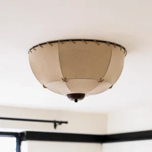 Duomo mid-century modern ceiling lamp installed in contemporary home interior with paneled fabric shade and dark wood ceiling mount
