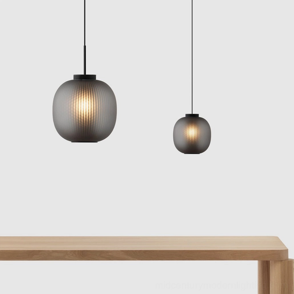 Multiple dynamic pendant lights creating visual depth in contemporary interior space