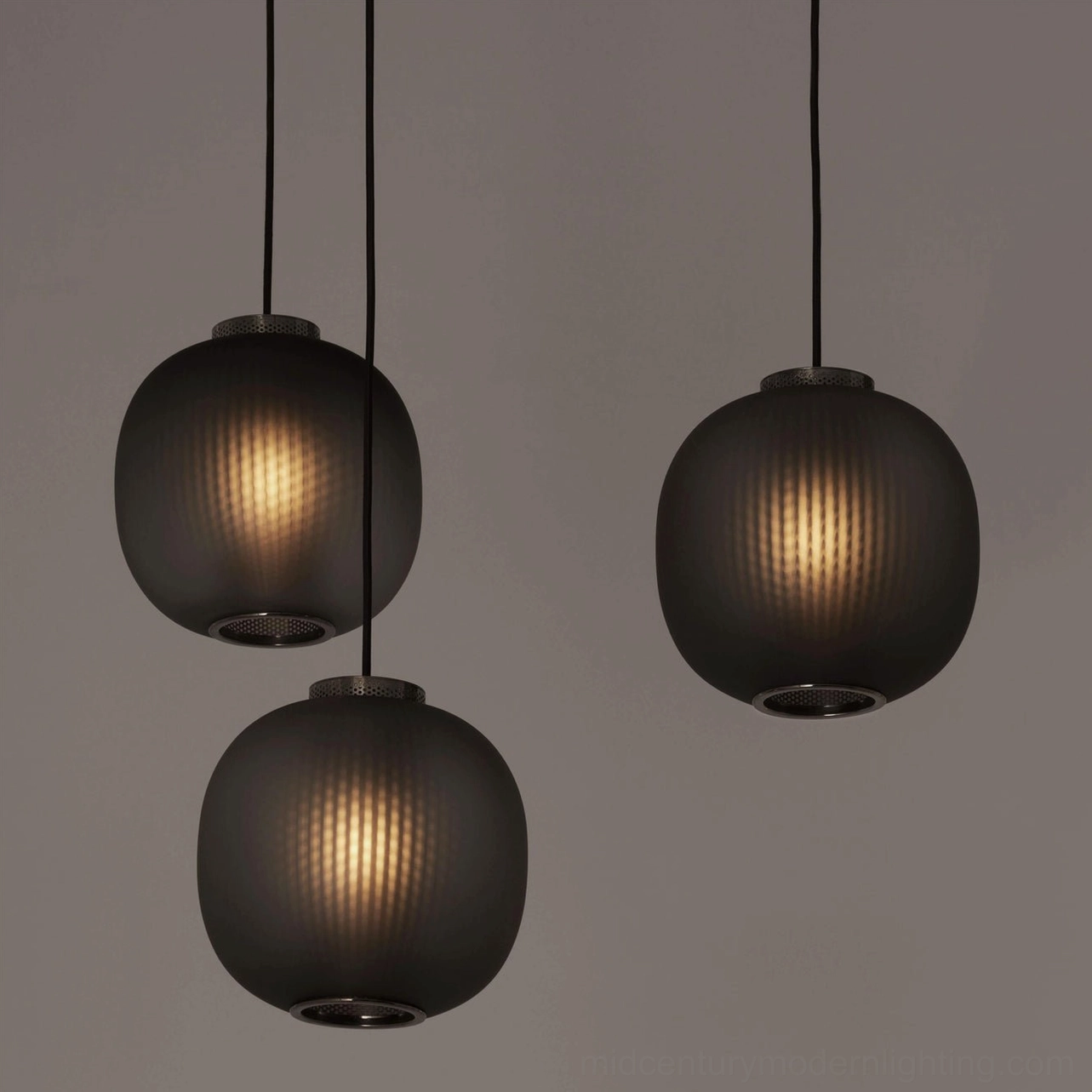 Dynamic pendant light fixture in white and gold finish, angled architectural view
