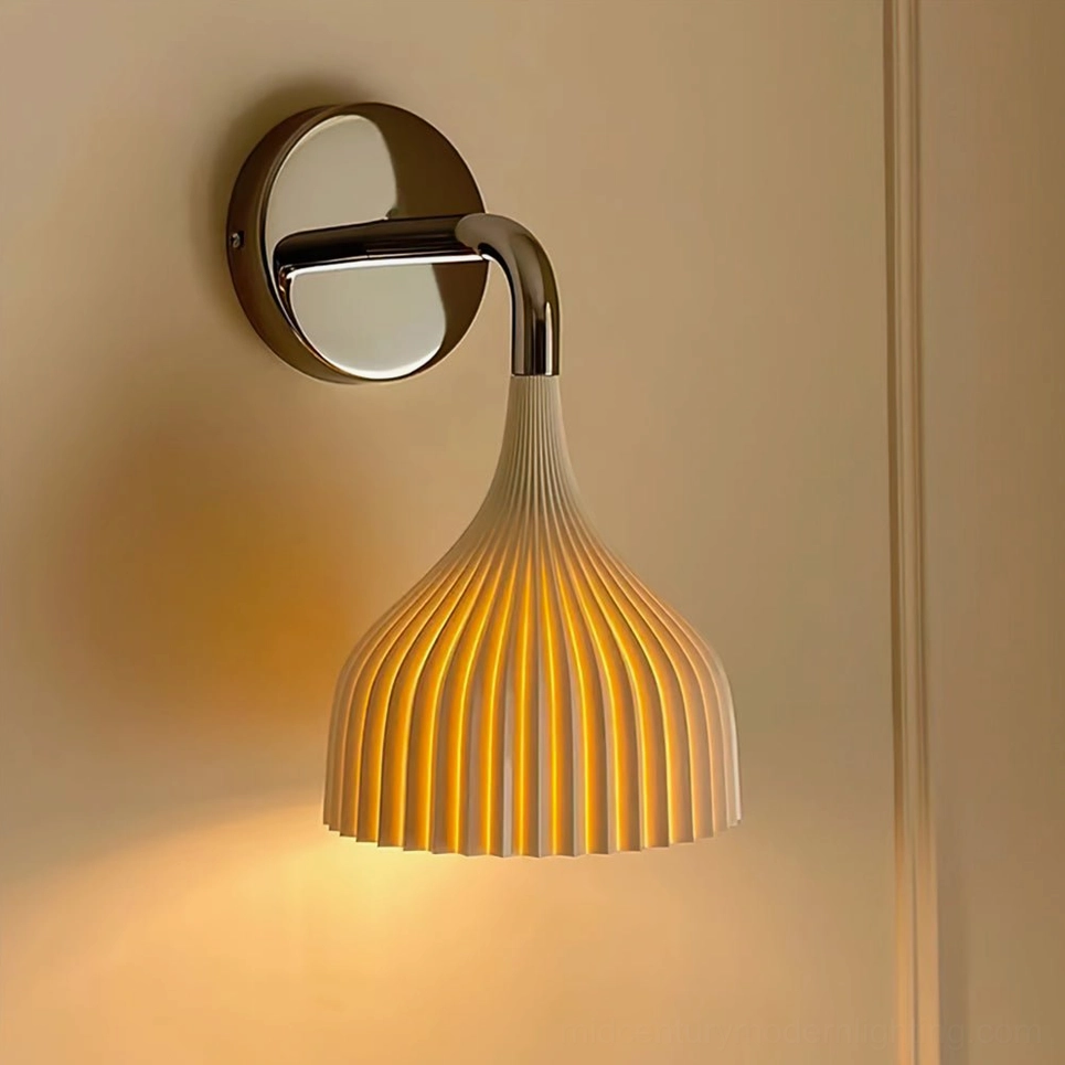 Amber ribbed glass wall lamp with bronze metal mount, warm glowing illumination