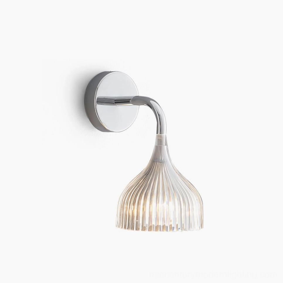 Clear ribbed glass wall lamp with curved chrome arm and bell-shaped shade on white background