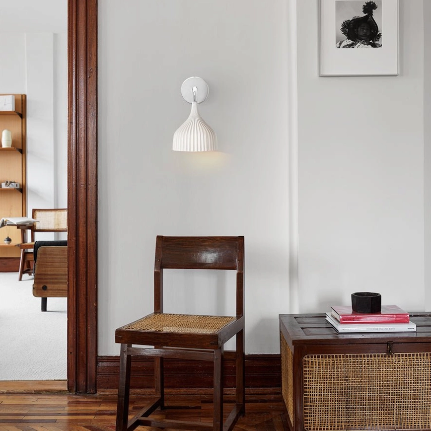 E wall lamp architectural detail showing ribbed glass texture and metal bracket construction