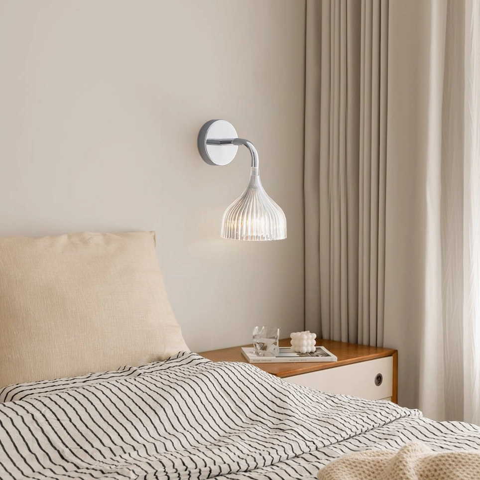 Mid-century modern ribbed wall lamp in Nordic bedroom setting, minimalist interior design