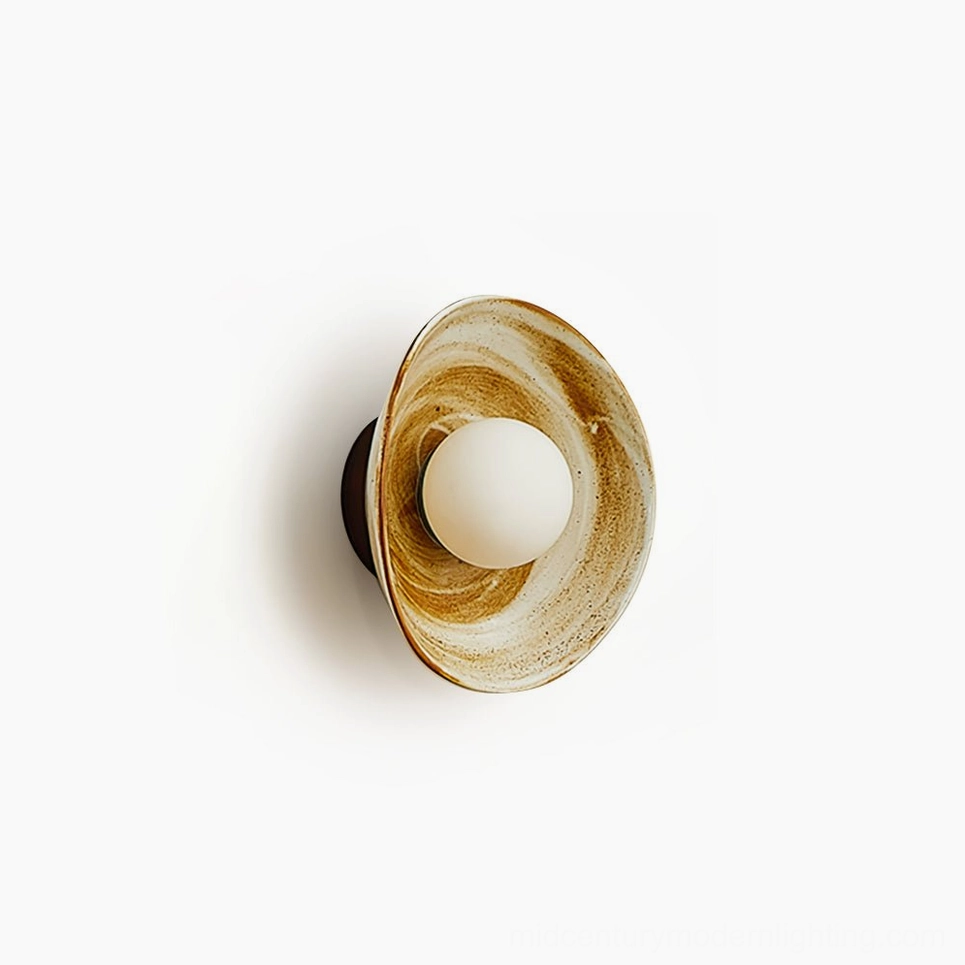 Eala ceramic wall lamp side view with marbled brown and white glaze, frosted glass bulb, modern sculptural design