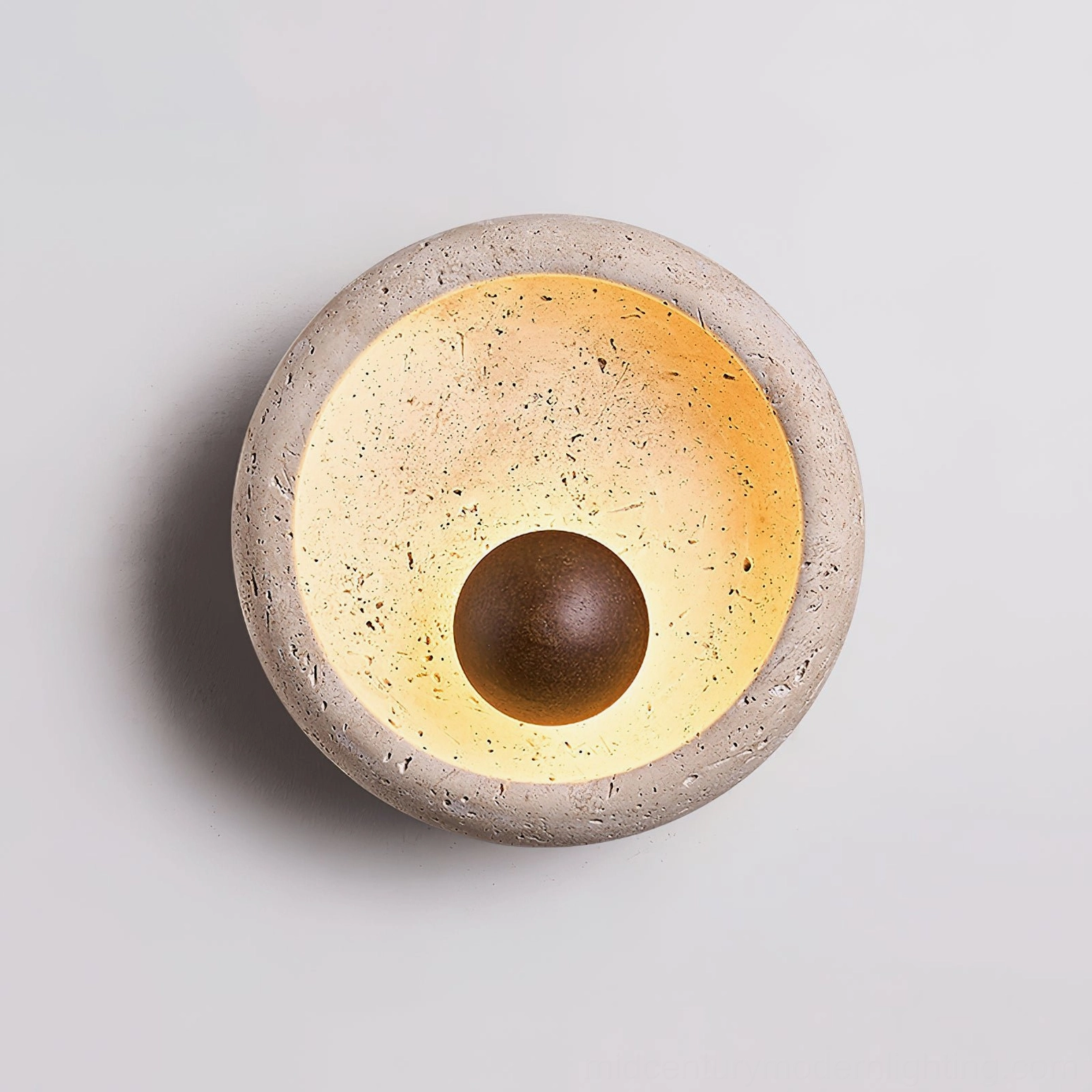 Eala travertine wall lamp installation example in contemporary home accent