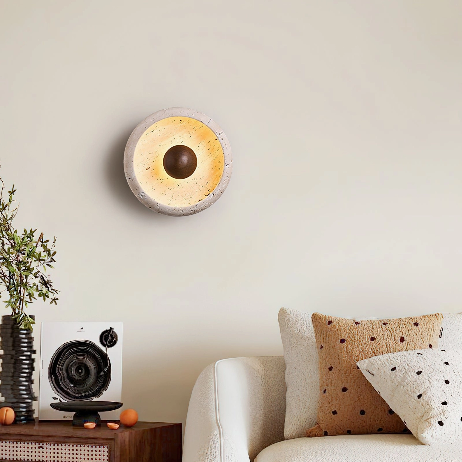 Eala travertine wall lamp overhead view in contemporary living room decor