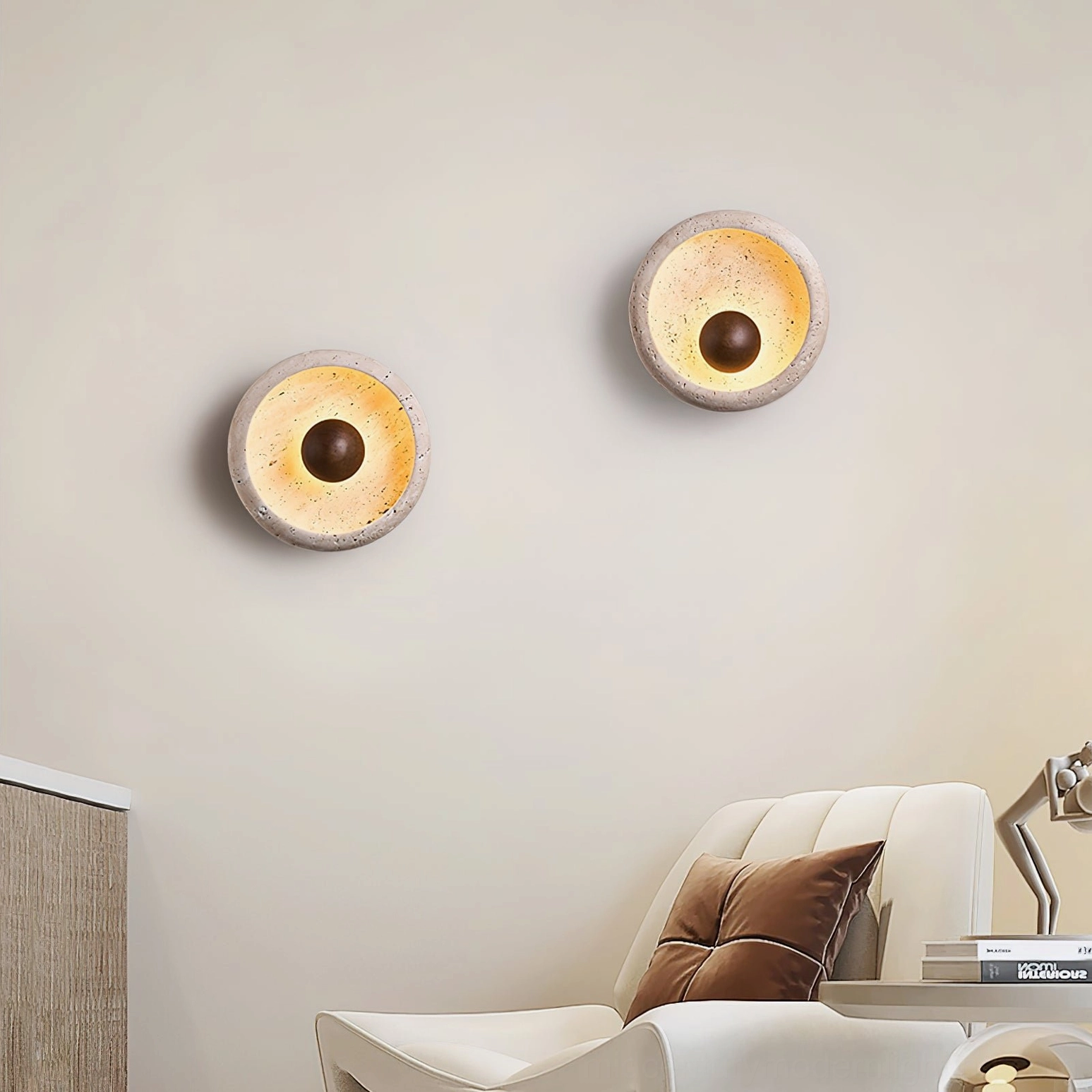 Pair of matching Eala travertine wall lamps in minimalist living room design