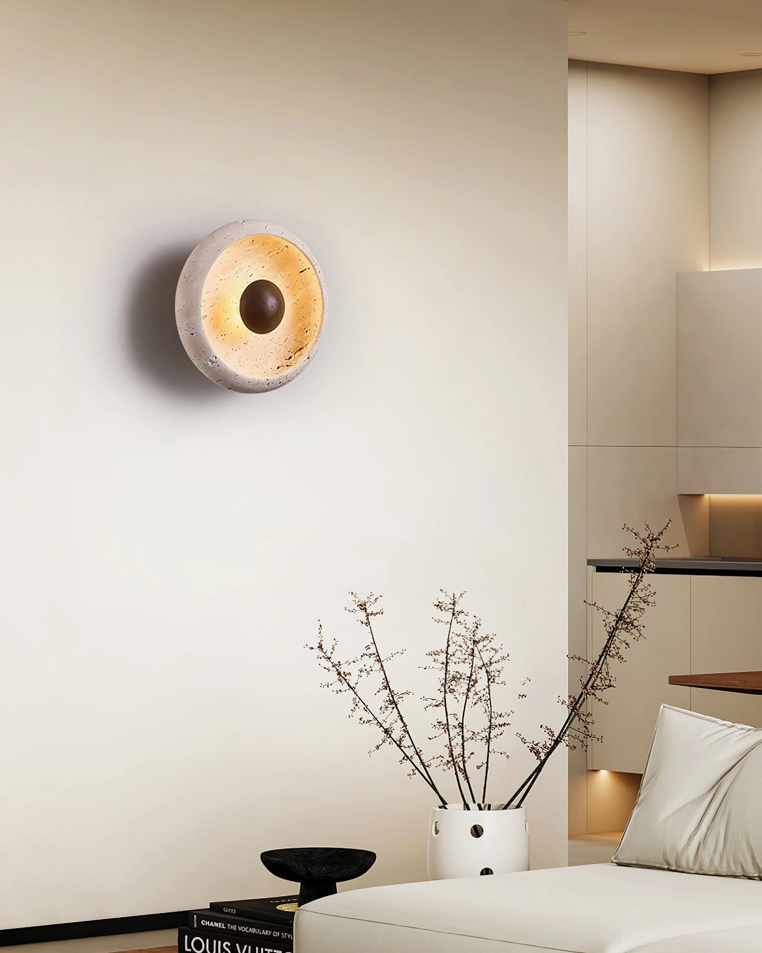 Eala travertine wall lamp sculptural form with natural mineral flecks detail
