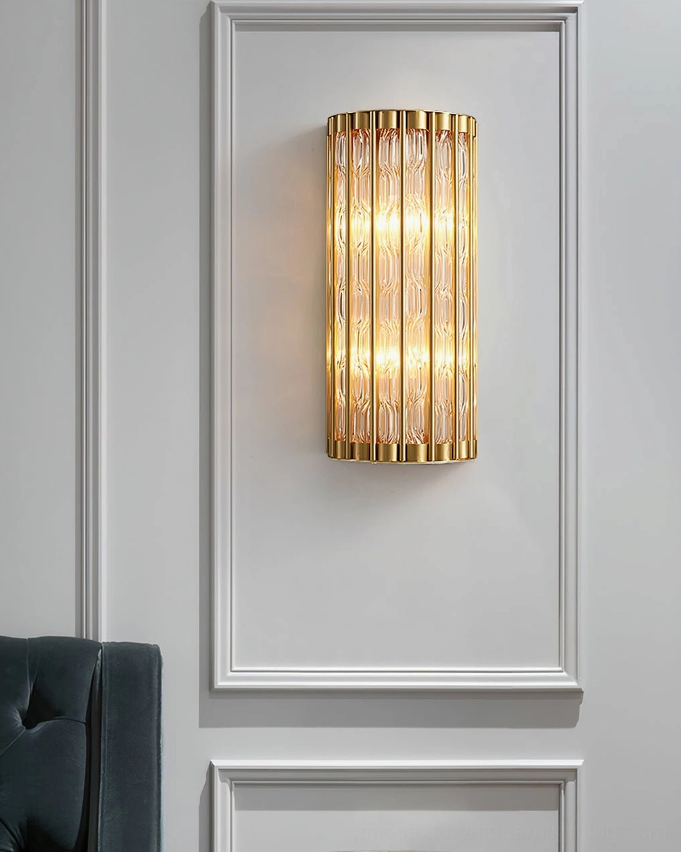 Contemporary wall mounted accent lamp in living room with wainscot paneling, polished brass and glass design