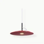 Burgundy matte metal disc pendant lamp shown in studio lighting, minimalist design with warm LED downlight