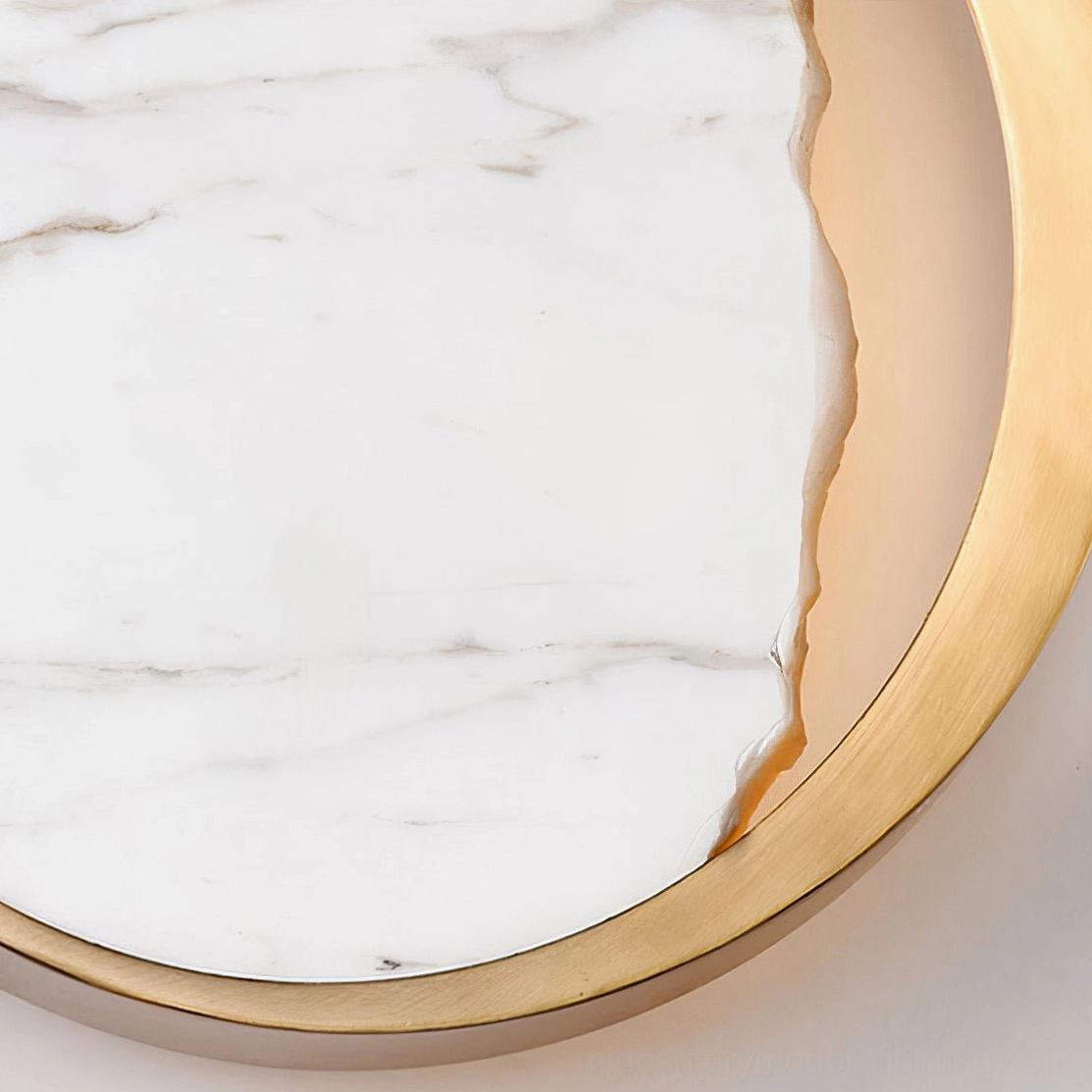 Eclipse marble wall lamp in minimalist interior space highlighting sculptural stone and metal design