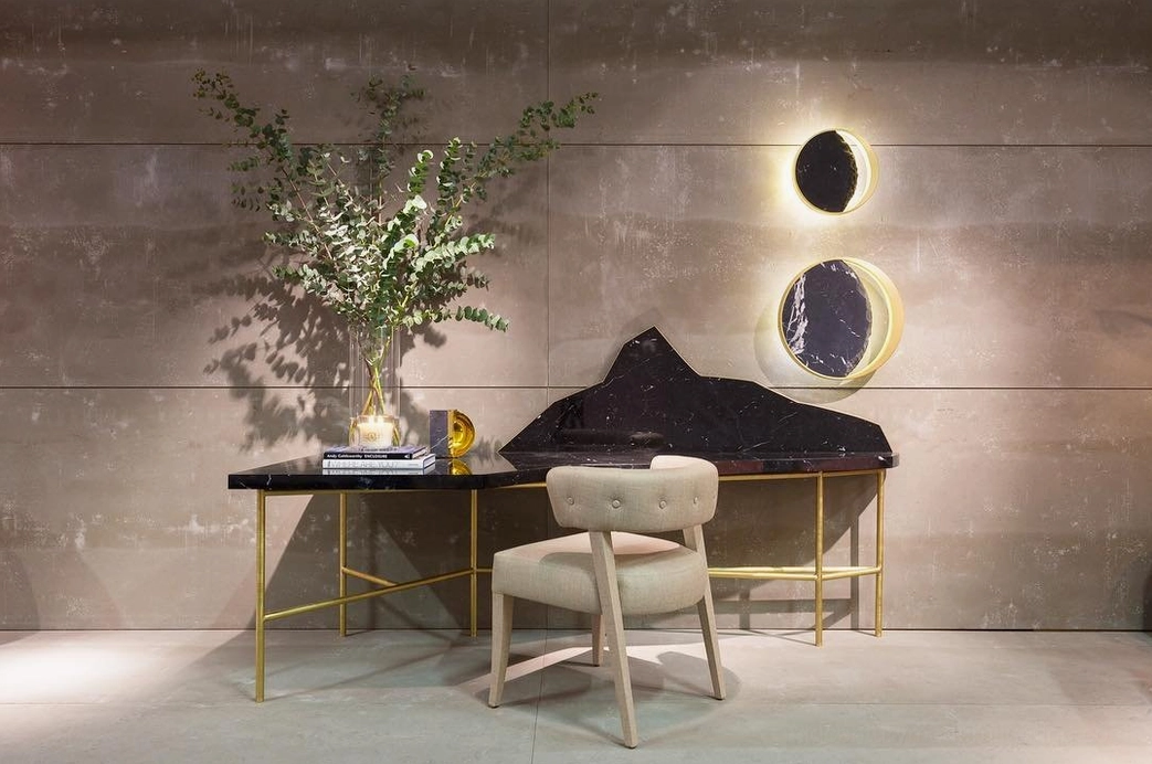 Eclipse wall sconce paired styling creating symmetrical luxury bedside lighting arrangement