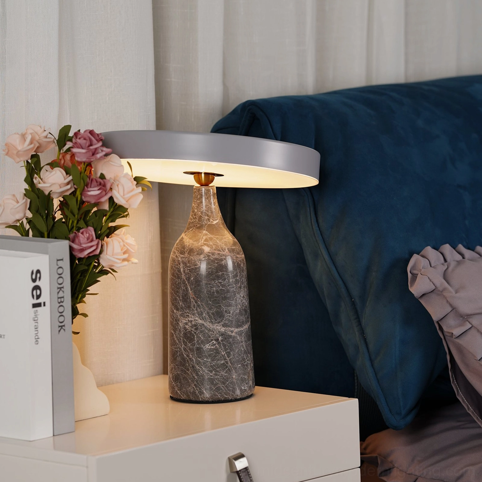 Black Eddy rotating table lamp sleek modern design aesthetic