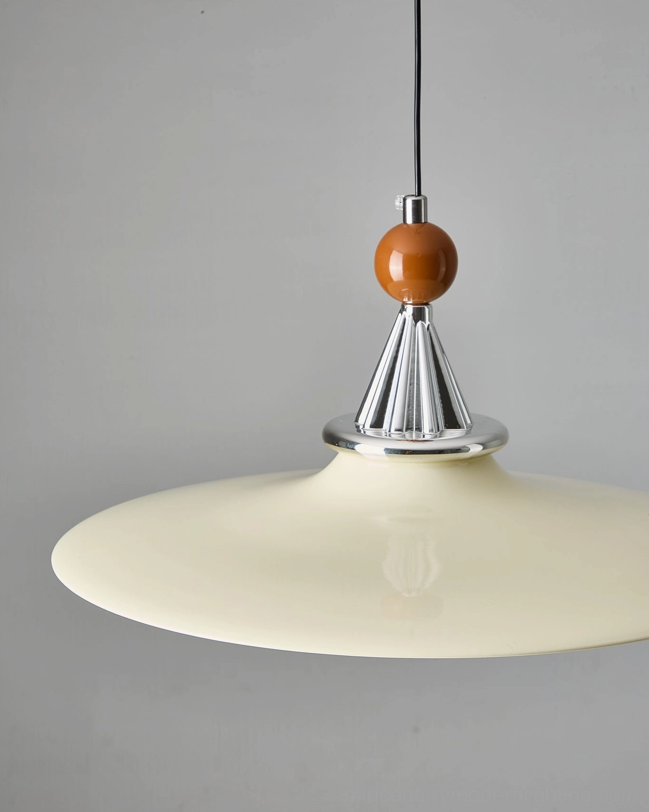 Black disc pendant light integrated LED warm glow interior ambiance