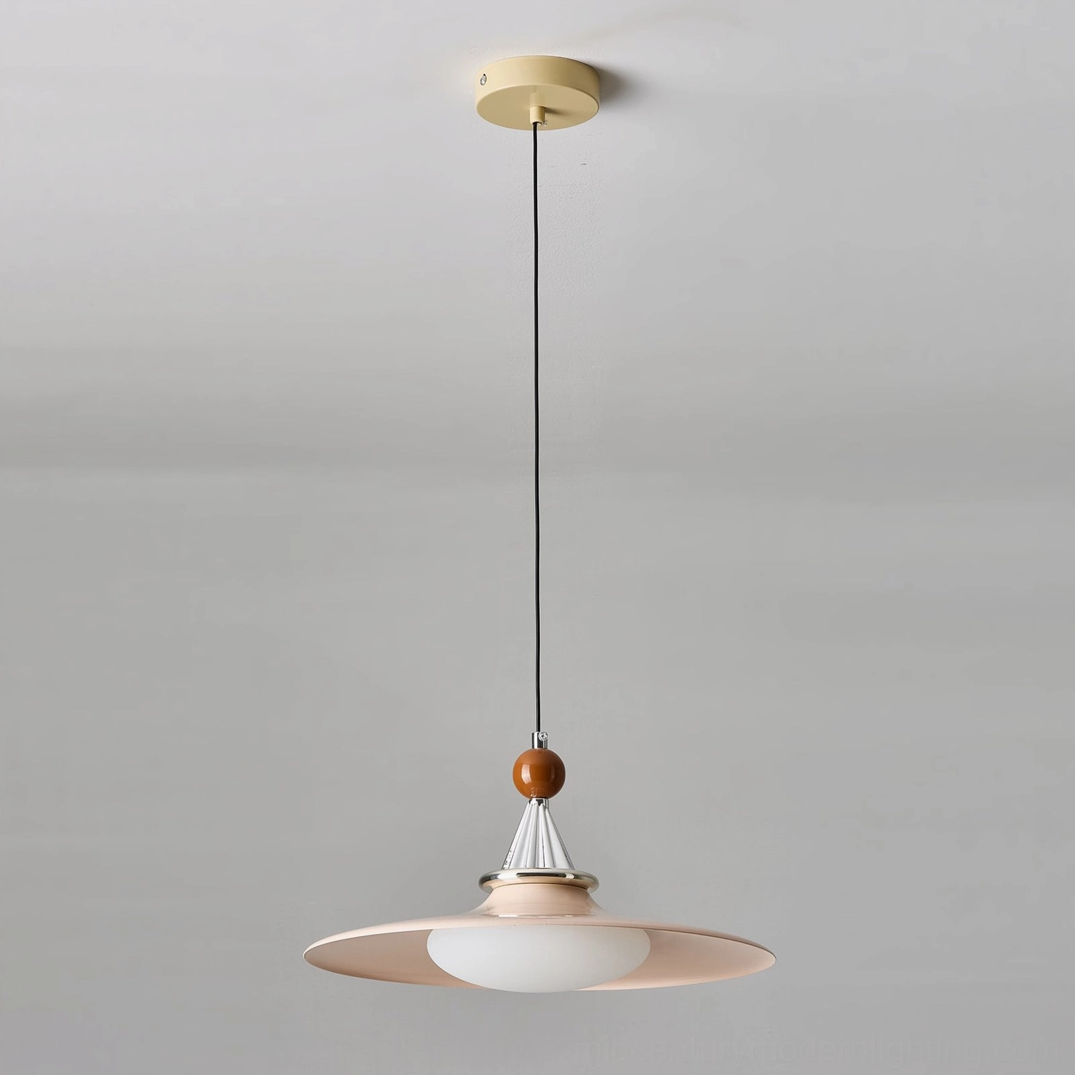 Pink disc shade pendant light showing authentic wood-grain finish detail