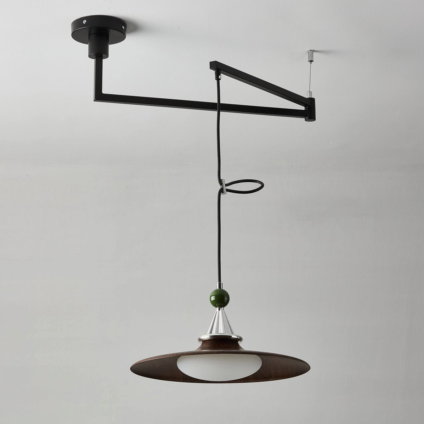 Eden swing arm pendant in pink color option with adjustable arm showing contemporary color variant for eclectic interiors