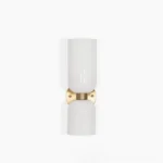 Edie blown glass wall sconce with white frosted glass shade and brass gold metal frame, frontal studio view