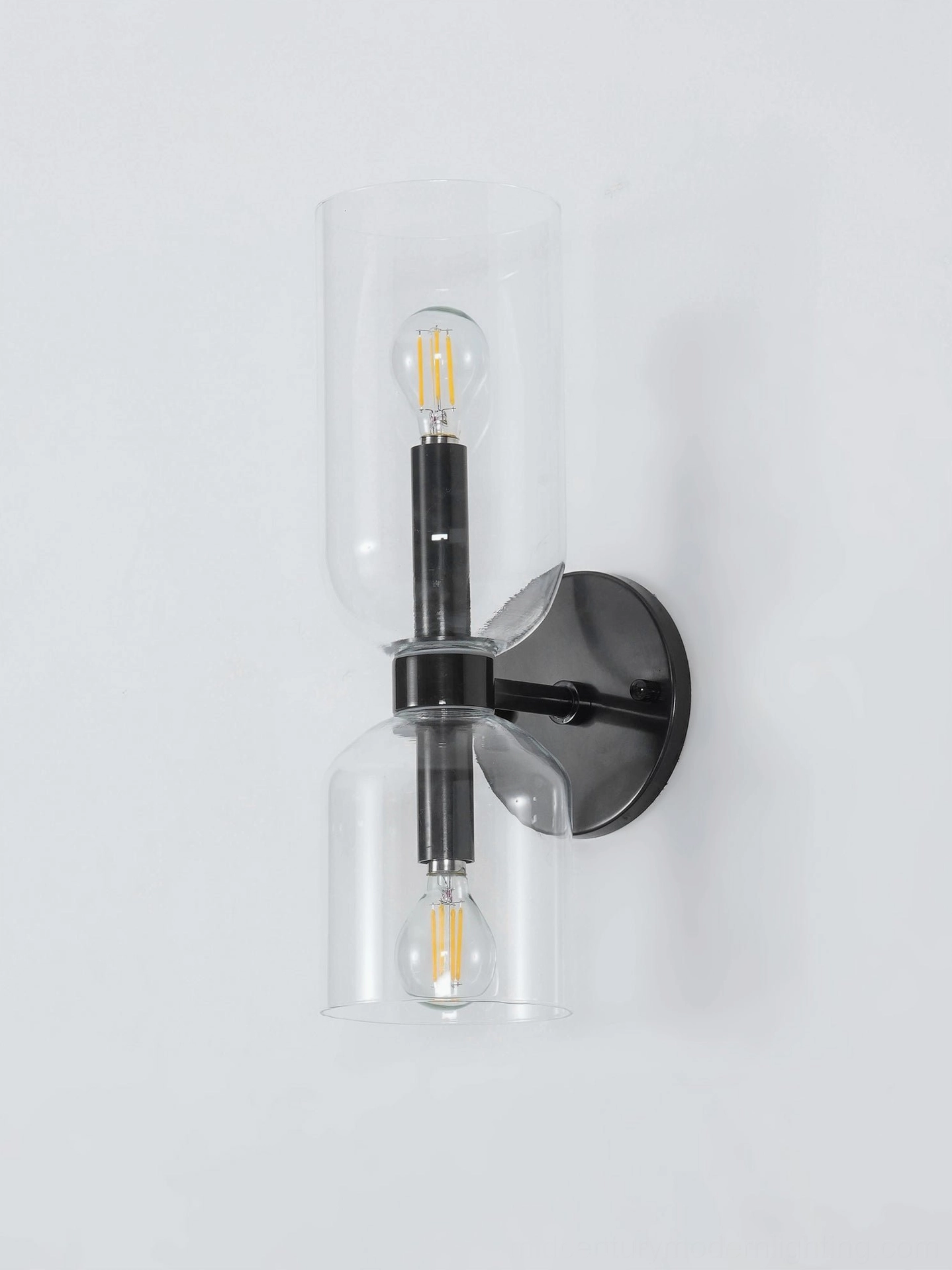 Hand-blown glass wall sconce demonstrating artisanal craftsmanship and contemporary design aesthetic