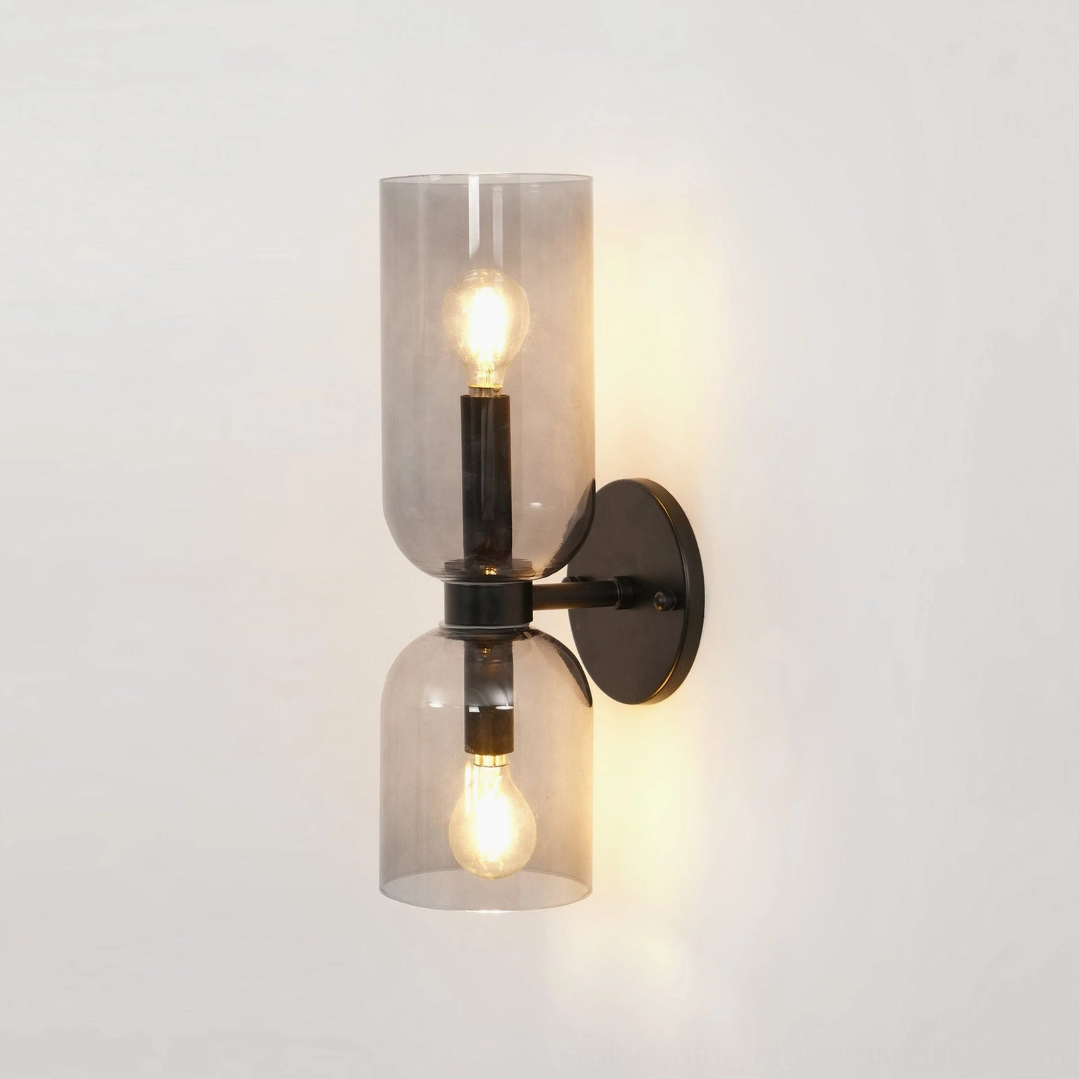 Hand-blown glass sconce product photography with white frosted shade and gold hardware