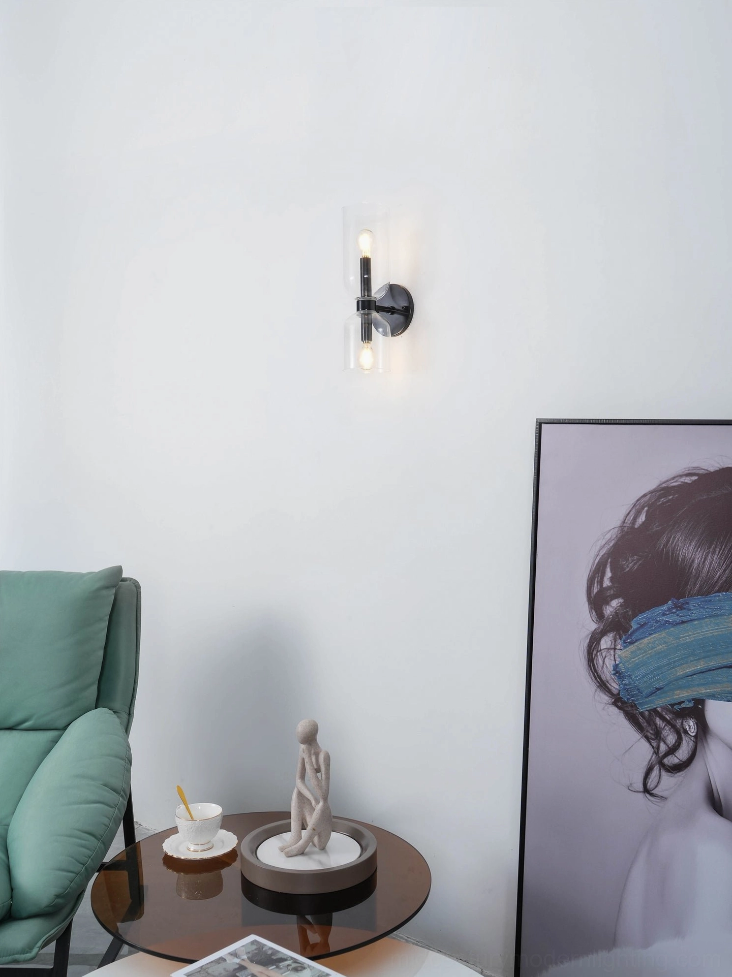 Edie wall sconce installed showcasing how hand-blown glass creates ethereal lighting effect in home