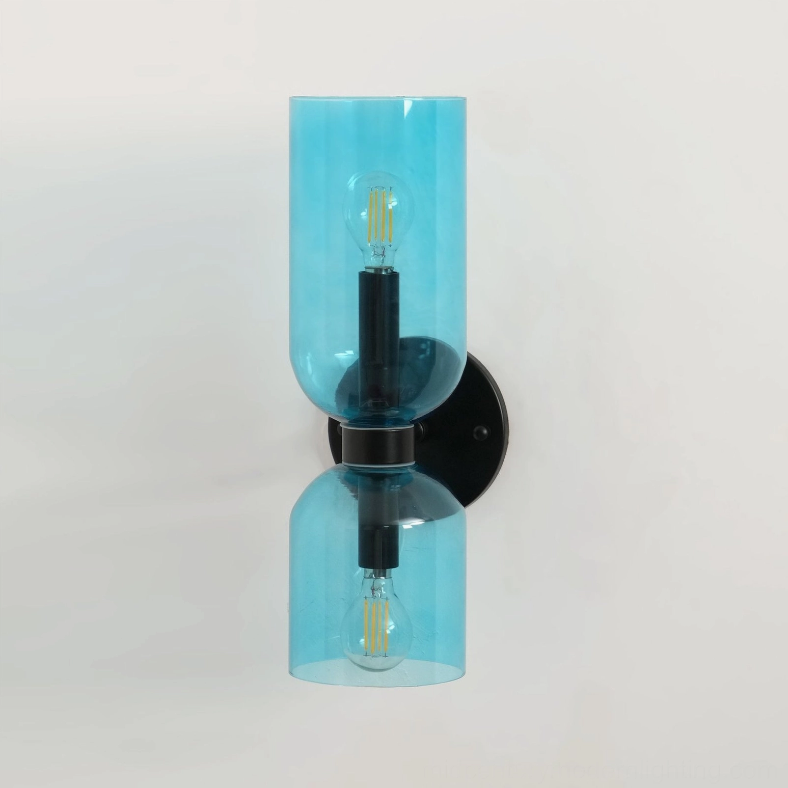 Contemporary wall lamp with frosted glass shade creating soft light diffusion and minimal aesthetic