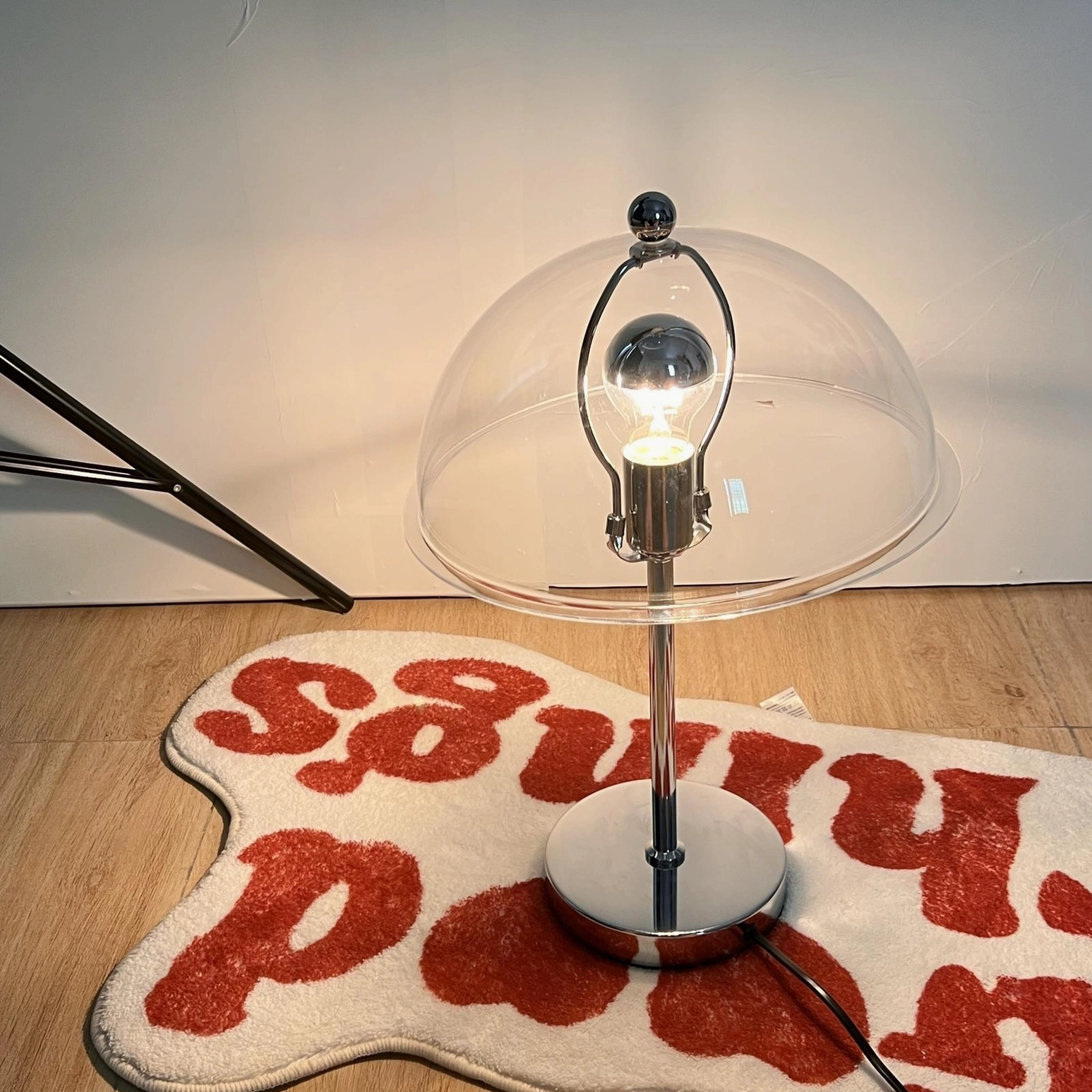 Edinburgh table lamp clear shade showing transparent acrylic bulb visibility and contemporary aesthetic