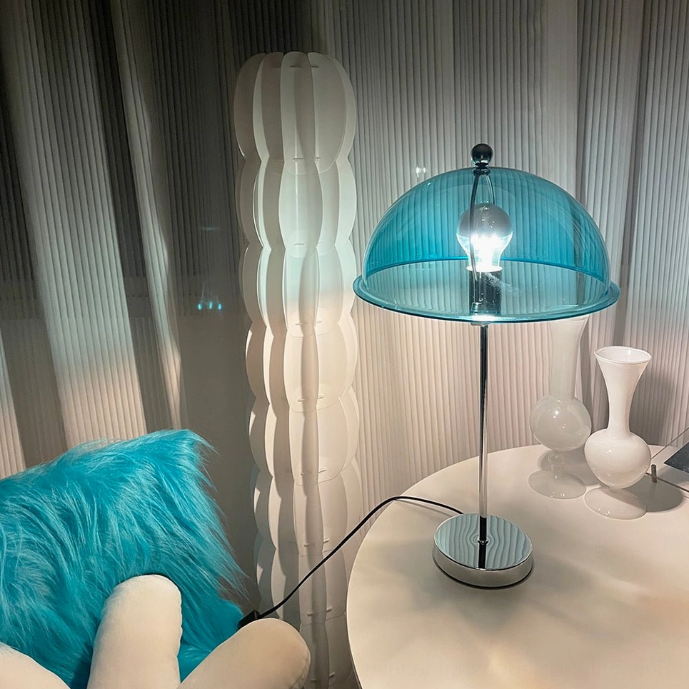 Edinburgh table lamp green shade in mid-tone lighting showing sage emerald color and glow quality