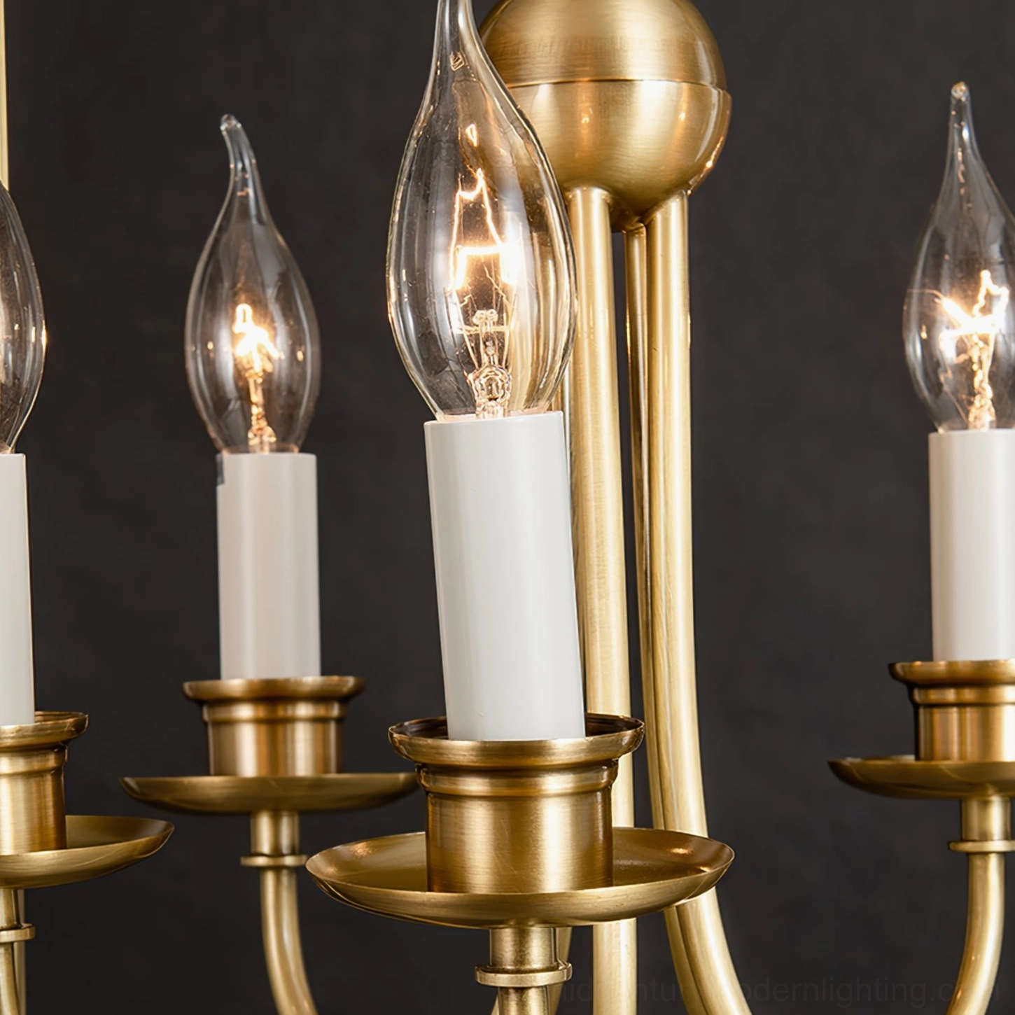 Lit Edison bulb candle arm detail brushed brass vintage filament illumination