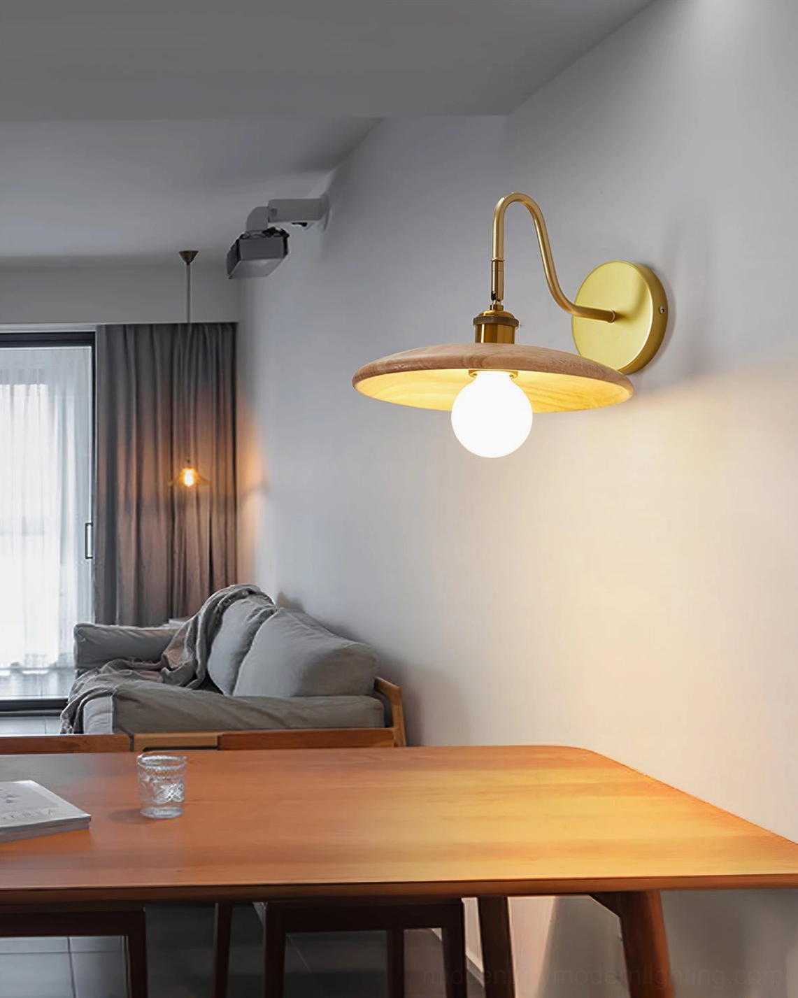 Edmund mid-century wood and brass wall lamp showing gooseneck articulation and curves