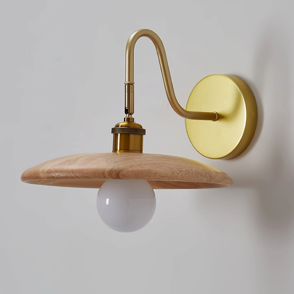 Edmund wooden wall lamp installed as bedside reading light with warm ambient glow