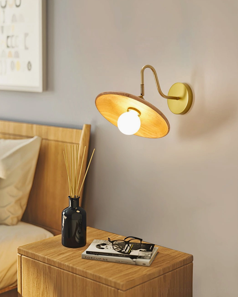 Edmund wooden wall lamp mounted on plain wall showing proportions and brass accents