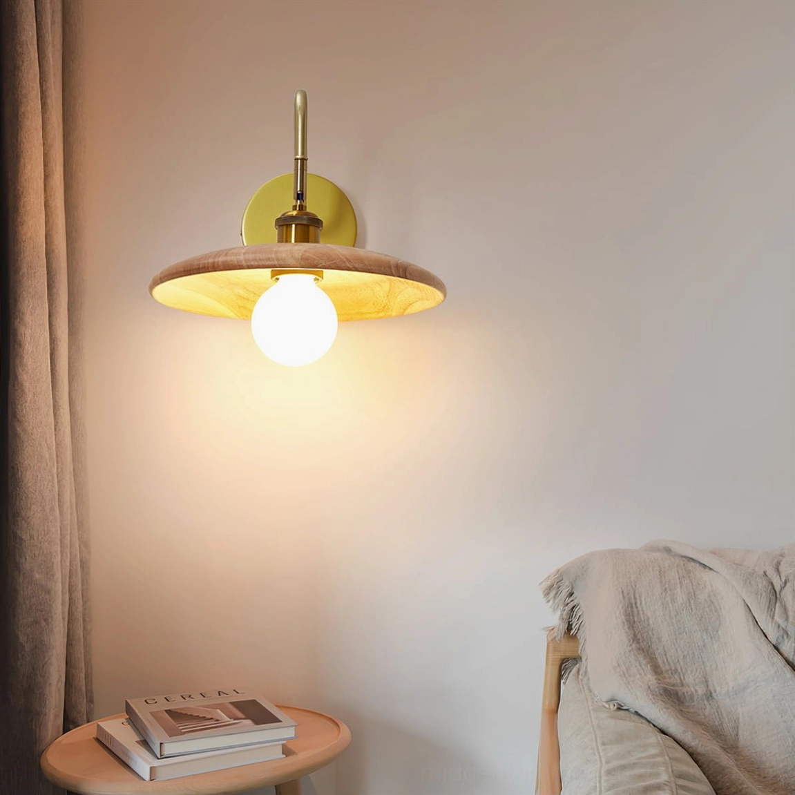 Edmund wall sconce in cozy living room corner with side table and minimalist interior styling