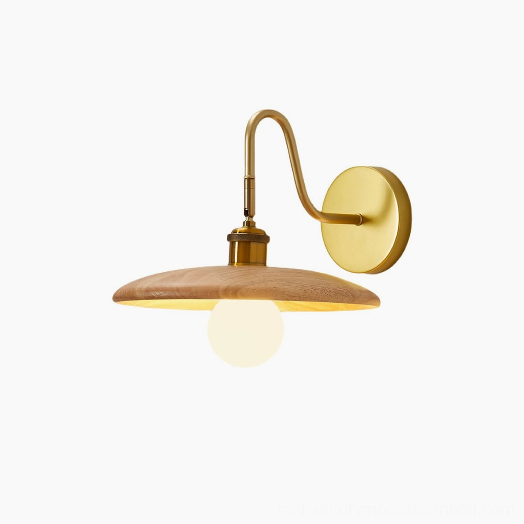 Edmund mid-century wall sconce lifestyle shot showing warm lighting in home environment