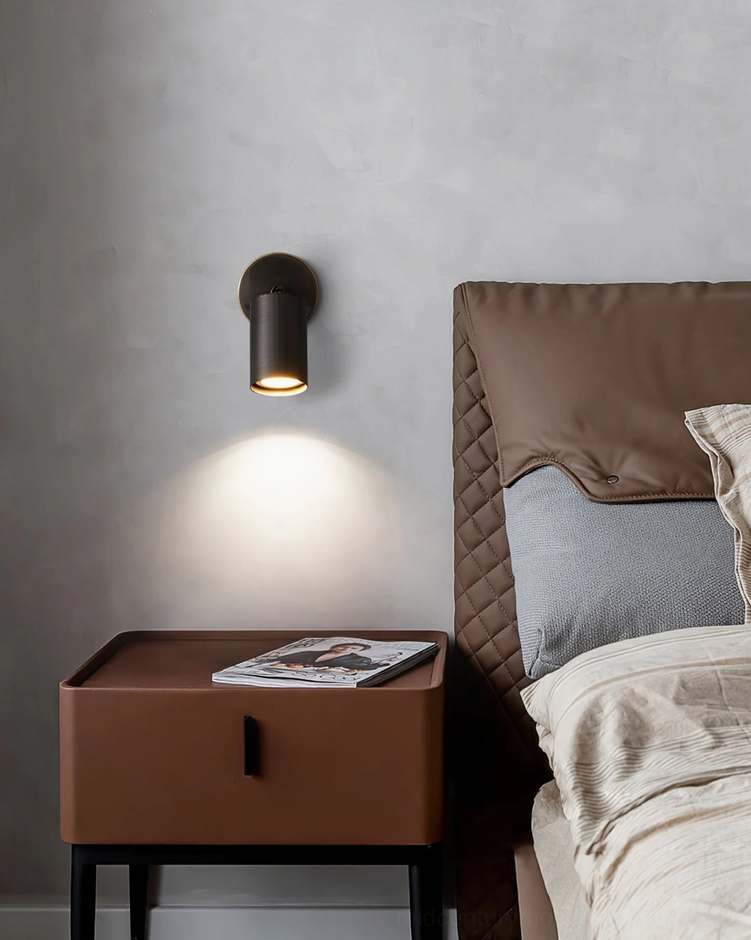 Eduard matte black wall sconce mounted in minimalist interior showcasing contemporary aesthetic