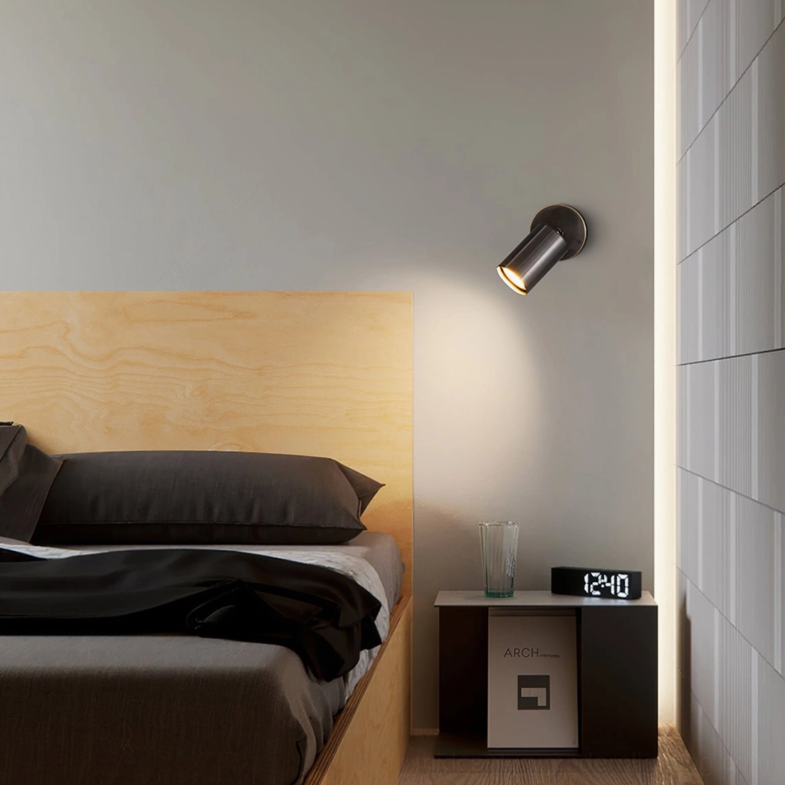 Eduard wall sconce detail view showing precision-engineered cylindrical shade design
