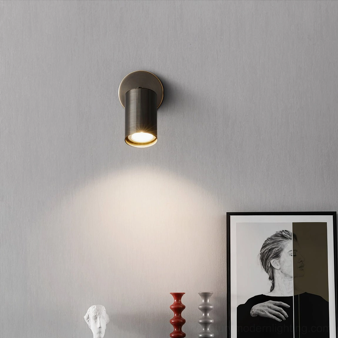 Eduard wall sconce paired with modern art display and home decor accessories