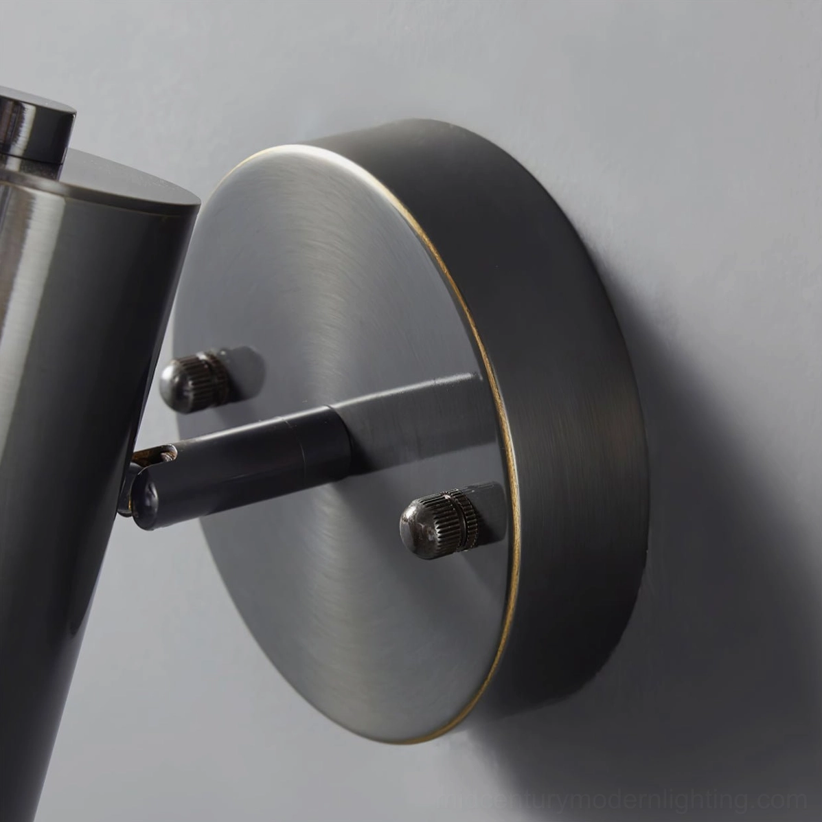 Eduard brass and black wall sconce color comparison showcasing both finish options