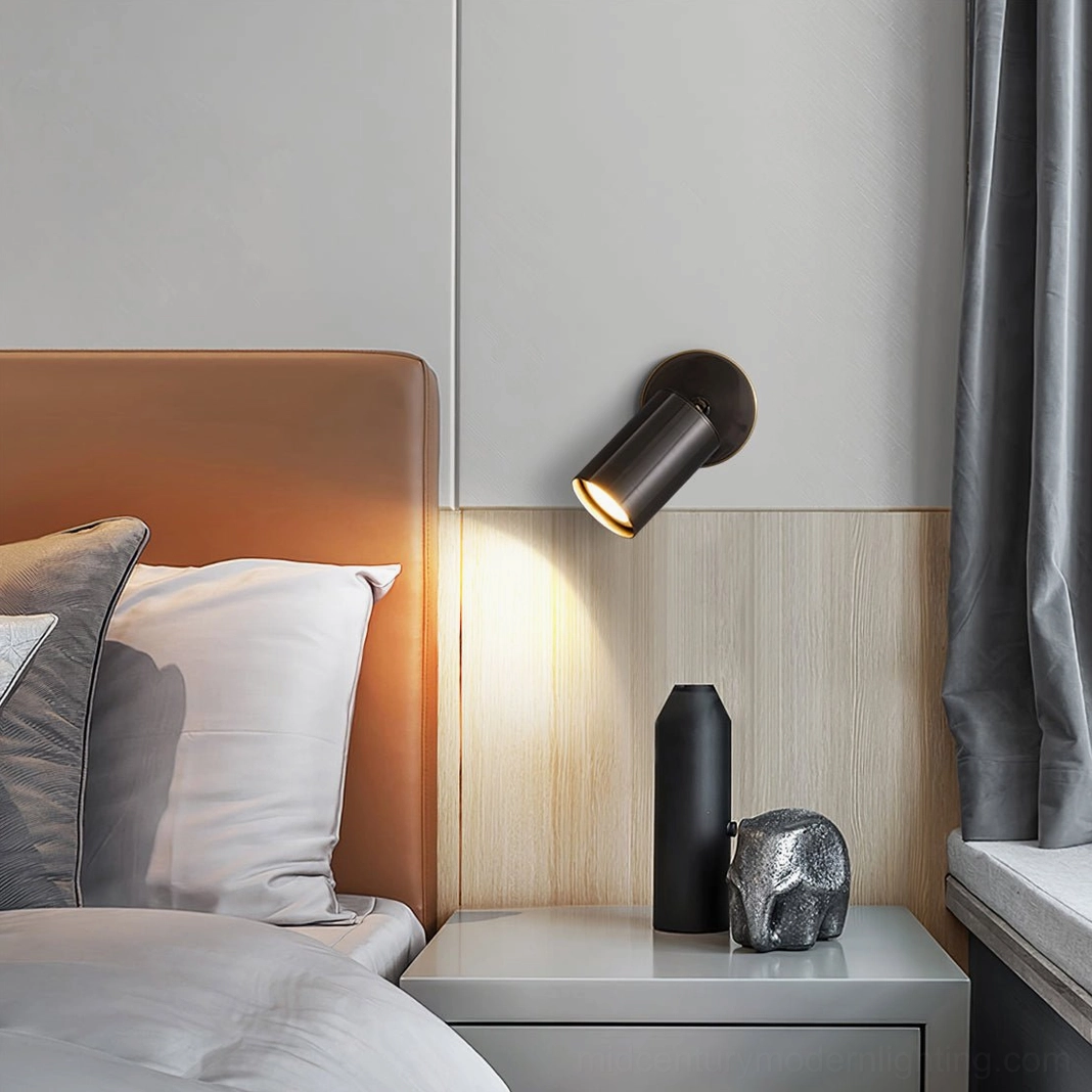 Eduard wall sconce ambient lighting creating warm pools of directional illumination