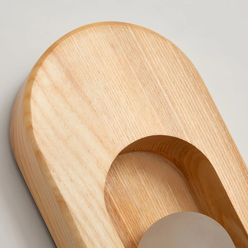 Egg sconce in natural wood color variant displayed on white background, product showcase