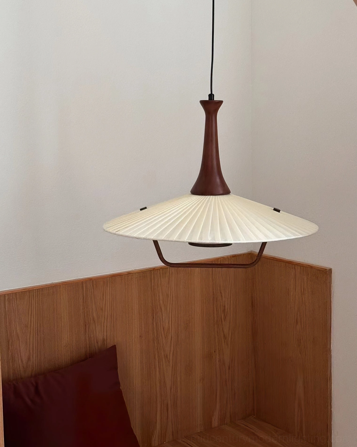 Eikon pendant lamp hanging in minimalist wooden panel nook with clean neutral Nordic decor