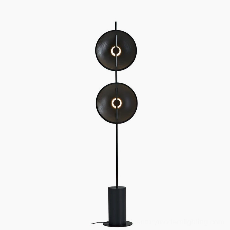 Eine black floor lamp variant with all-black metal construction and contemporary minimalist appeal
