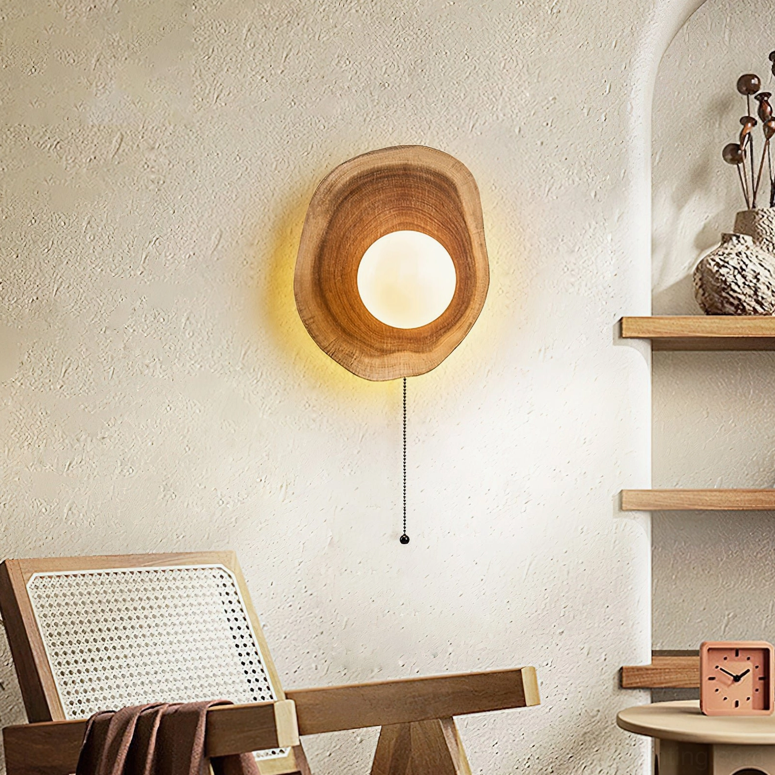 Eivor wooden wall sconce detail shot emphasizing natural material craftsmanship, frosted glass diffuser and organic asymmetrical frame silhouette
