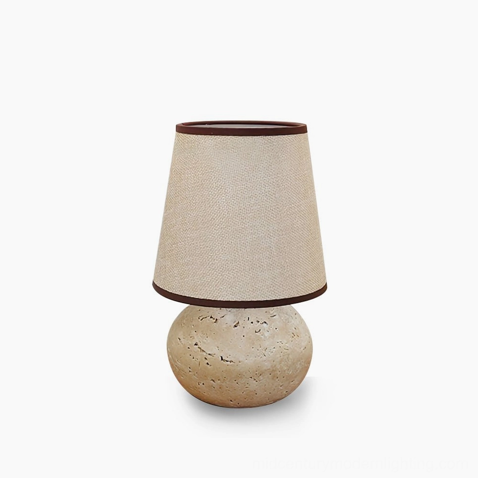 Elba travertine table lamp hero shot showing complete design with natural stone base and premium fabric shade, mid-century modern lighting fixture