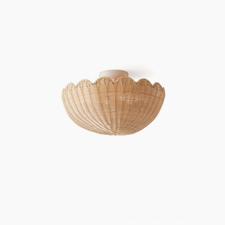 Small diameter handwoven rattan ceiling lamp showing minimalist bohemian design and natural material aesthetic