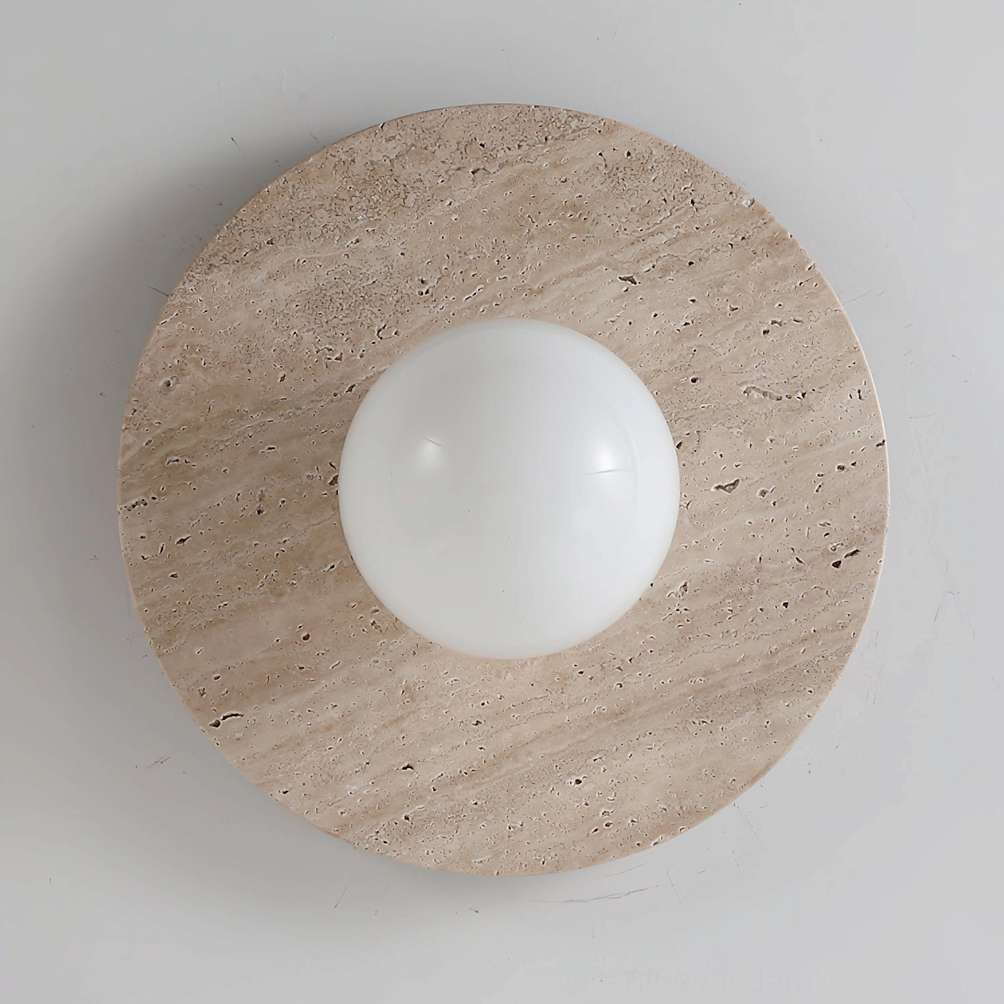 Elira natural stone wall lamp installation showing electrical connection point and mounting hardware integration