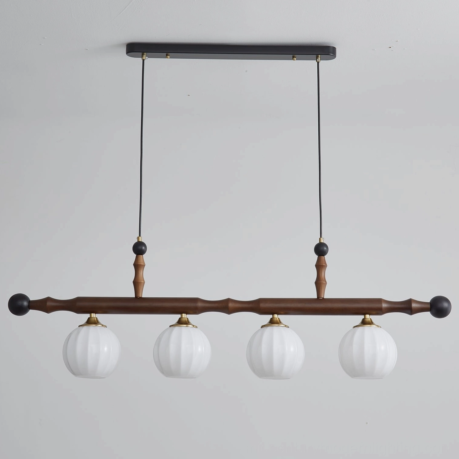 Elisha linear chandelier with matte white ribbed glass shades and walnut wood beam - front studio view