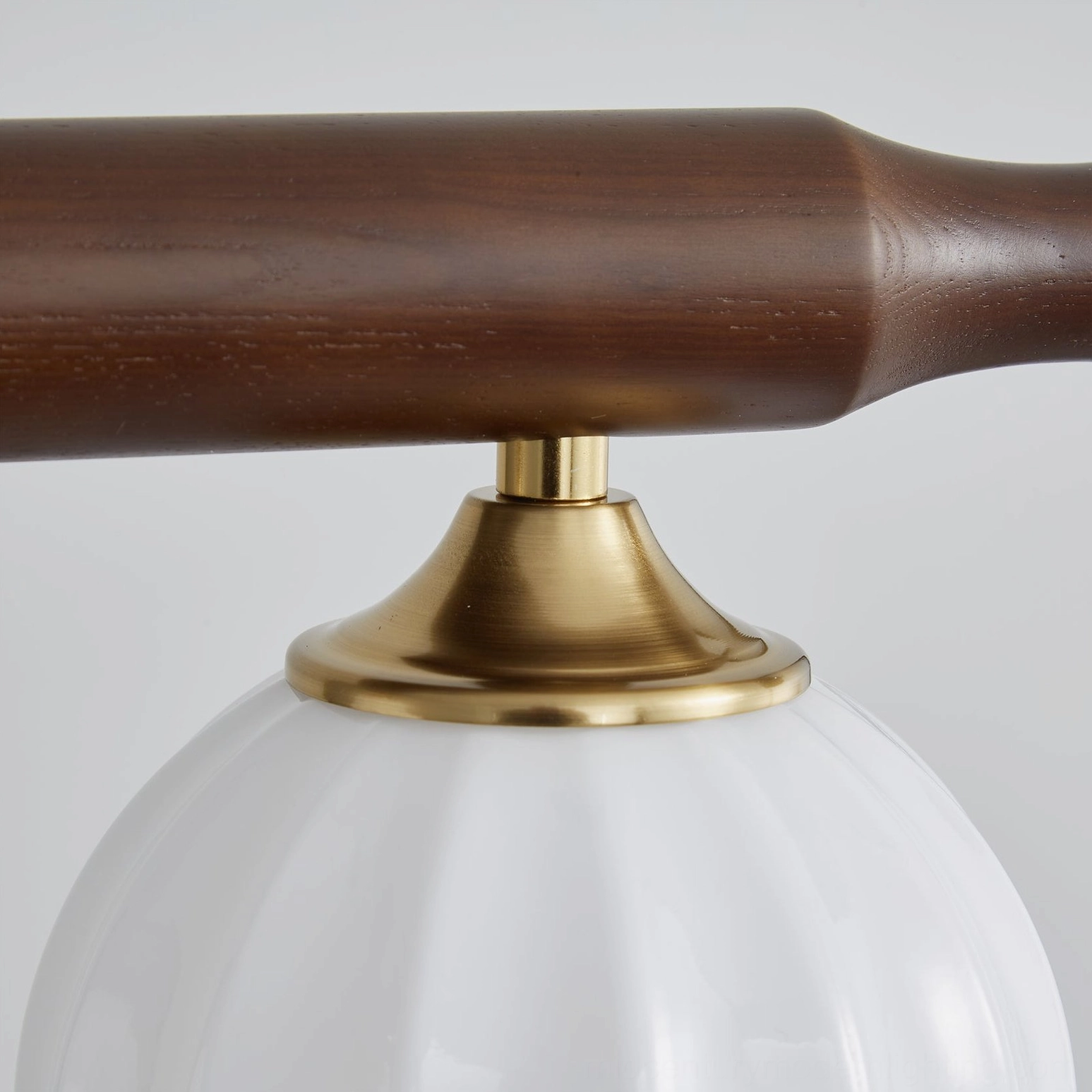 Elisha linear 4-light pendant chandelier assembly showing wood beam and glass shade configuration