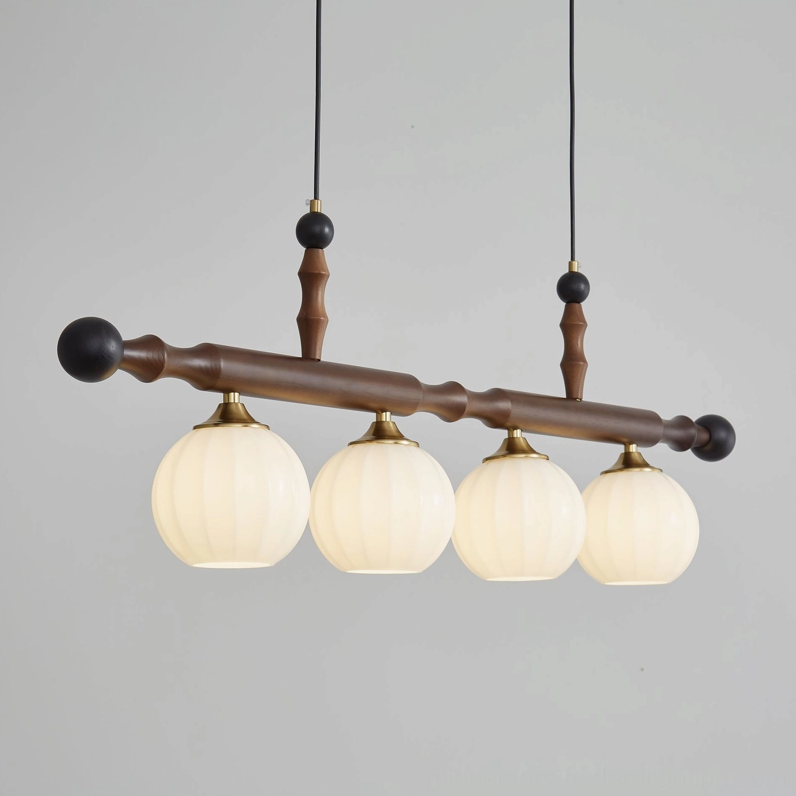 Elisha pendant light fixture showcasing complete wood and glass construction in natural lighting