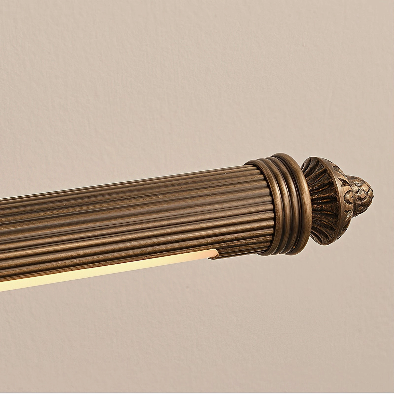 Wide ellesmere brass sconce installation above console table with decorative accessories